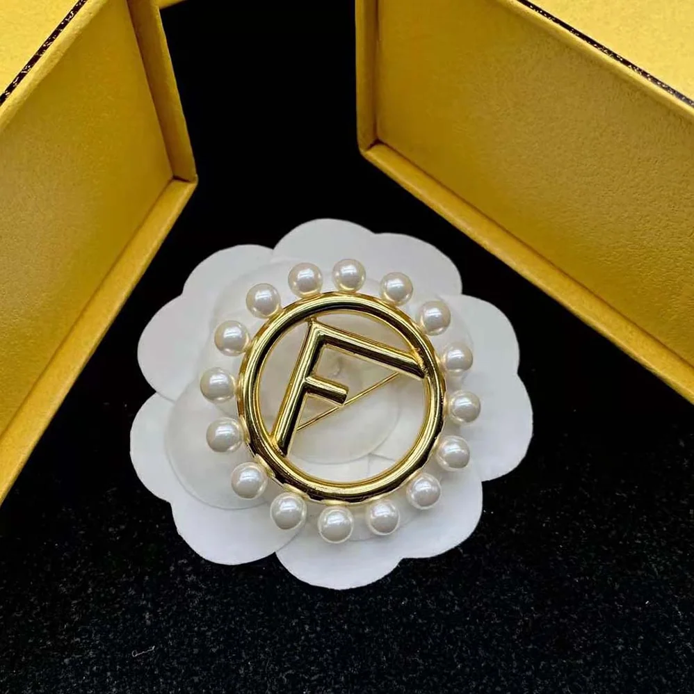 Fendi F Is Fendi Brooch Gold Colored Brooch for Women Fendi F Is Fendi Brooch Gold Colored Brooch for Women