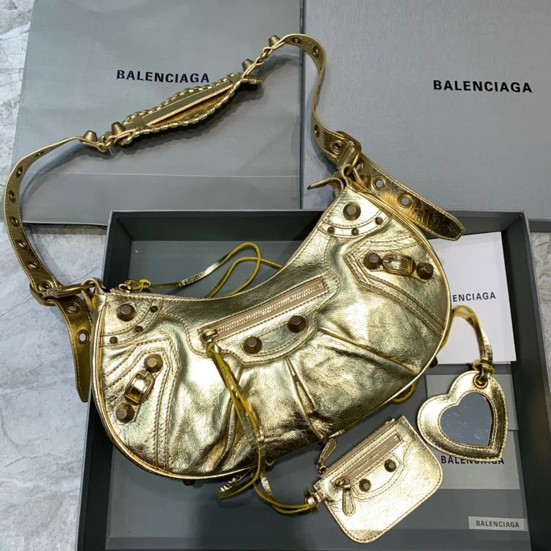 Balenciaga Le Cagole XS Shoulder Bag In Gold