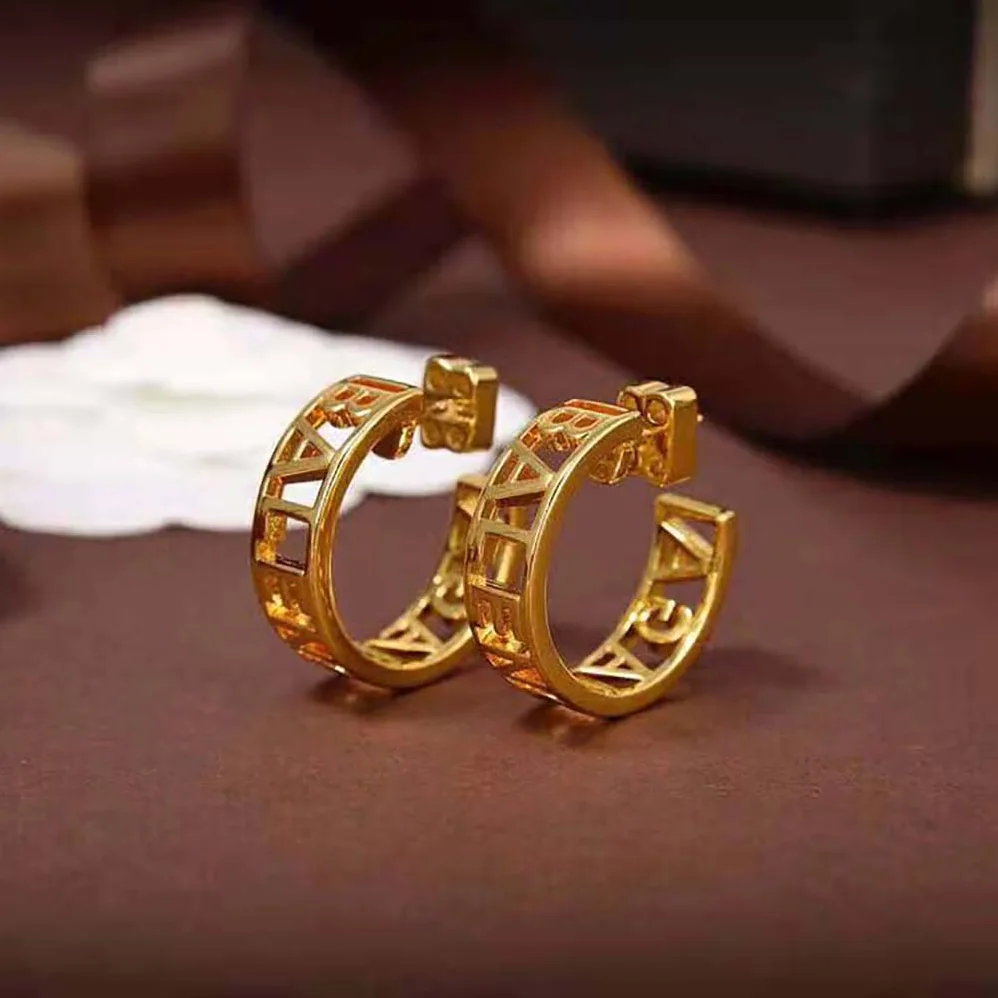 Balenciaga Logo Earrings in Gold Brass for Women