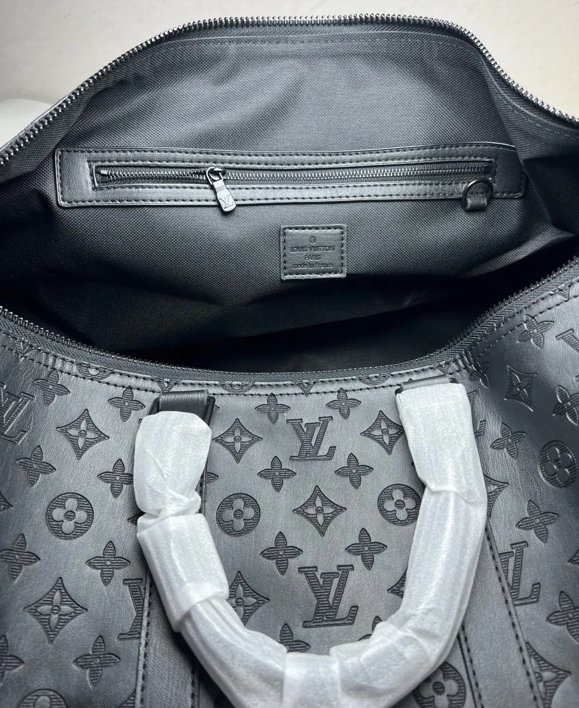 Louis Vuitton Keepall Bandouliere 50 Travel Bag in Black Matte Black Hardware Louis Vuitton Keepall Bandouliere 50 Travel Bag in Black Matte Black Hardware
