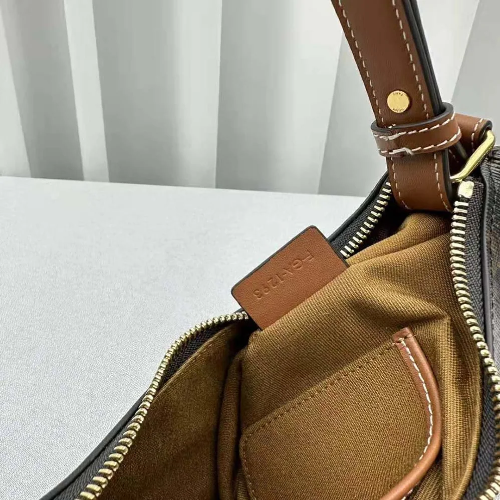 Celine Ava Triomphe Soft Bag in Triomphe Canvas and Calfskin for Women