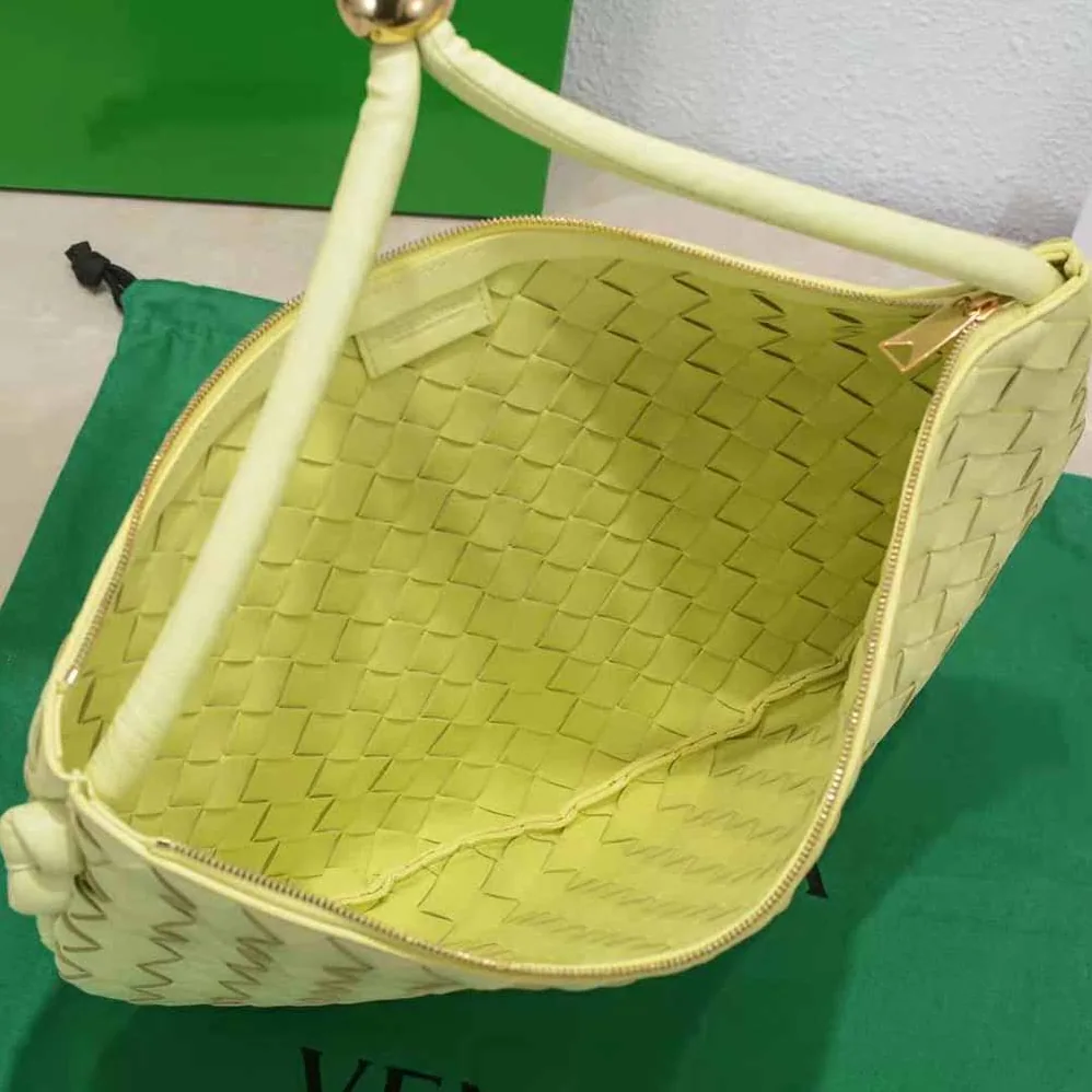 Bottega Veneta Turn Medium Intrecciato Leather Pouch with Adjustable Strap for Women in Yellow Bottega Veneta Turn Medium Intrecciato Leather Pouch with Adjustable Strap for Women in Yellow