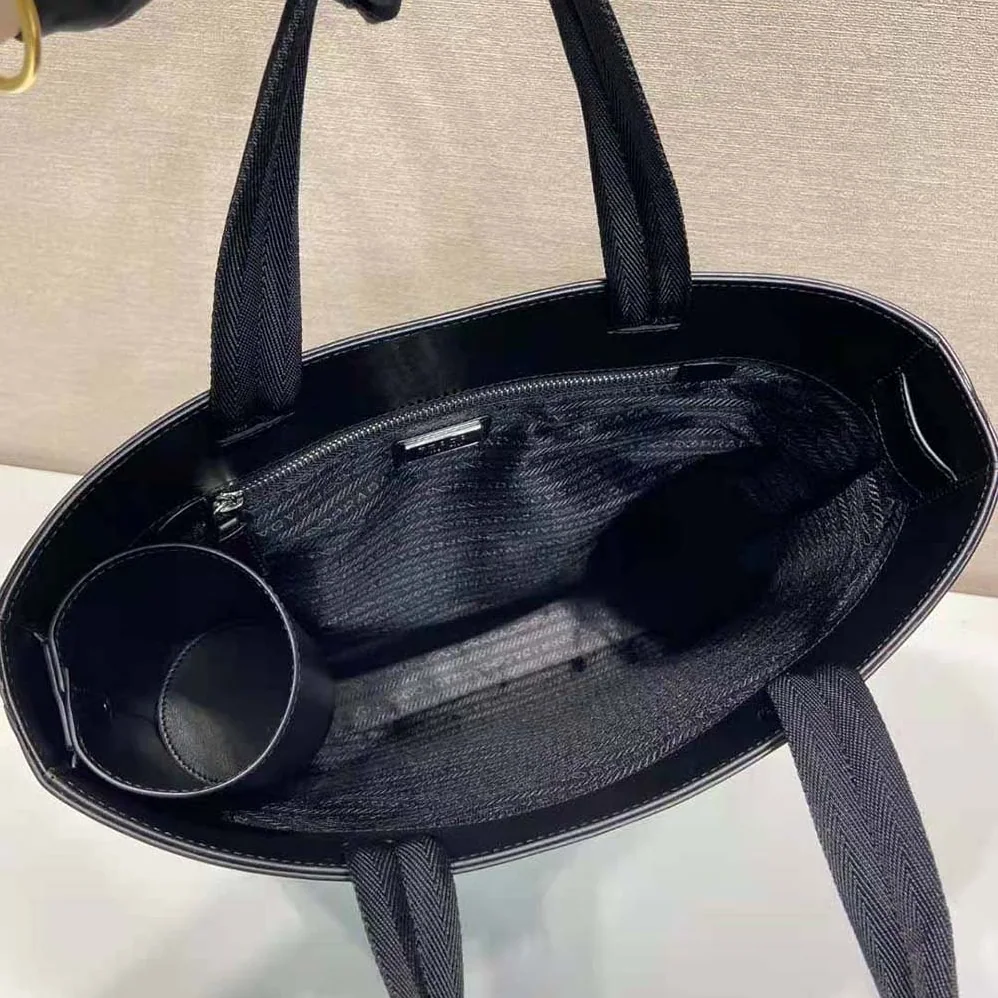 Prada Brushed Leather Tote Bag with Water Bottle for Men in Black