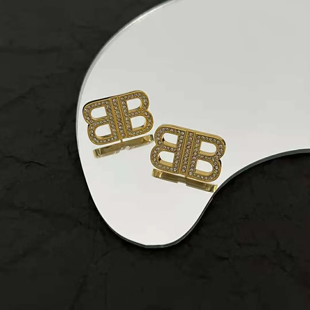Balenciaga BB 2.0 XS Earrings in Gold Brass and Rhinestones for Women Balenciaga BB 2.0 XS Earrings in Gold Brass and Rhinestones for Women
