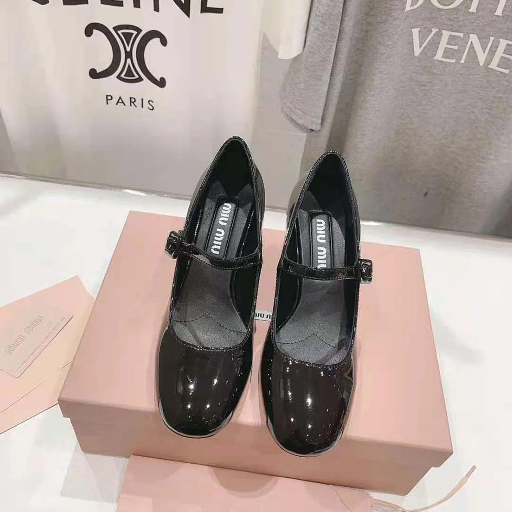 Miu Miu Patent Leather Pumps with Metal Lettering Logo for Women in Black Miu Miu Patent Leather Pumps with Metal Lettering Logo for Women in Black