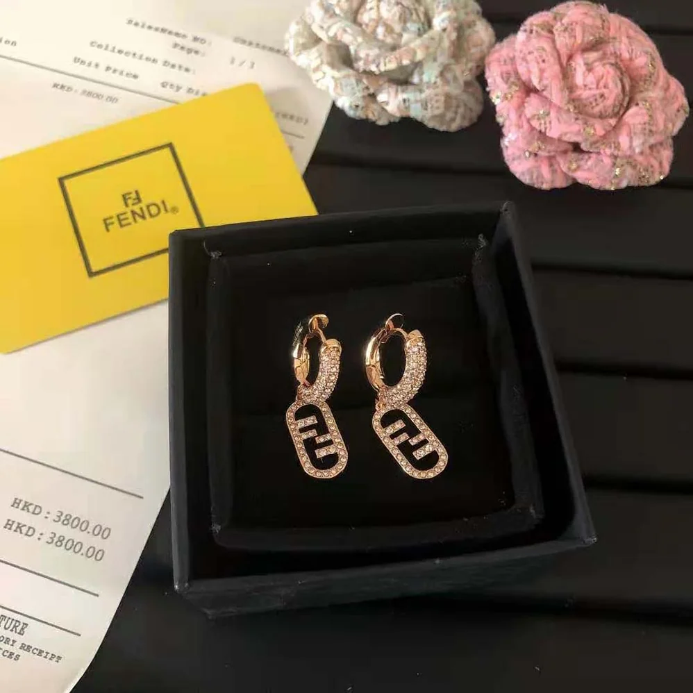 Fendi O Lock Earrings Gold-Colored Earrings in Bronze and Zircon for Women Fendi O Lock Earrings Gold-Colored Earrings in Bronze and Zircon for Women