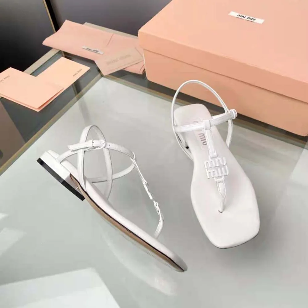 Miu Miu Patent Thong Sandals with Metal Lettering Logo for Women in White Miu Miu Patent Thong Sandals with Metal Lettering Logo for Women in White