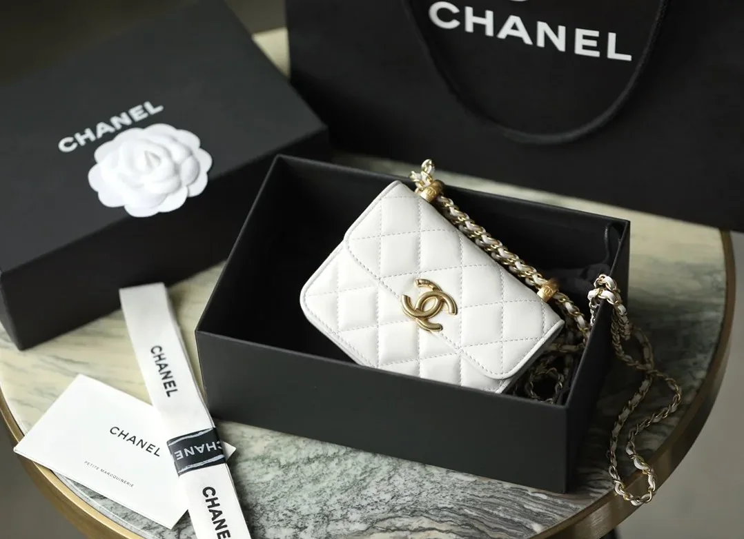 Chanel CO-CO Clutch With Chain in Gold Toned Hardware White Chanel CO-CO Clutch With Chain in Gold Toned Hardware White