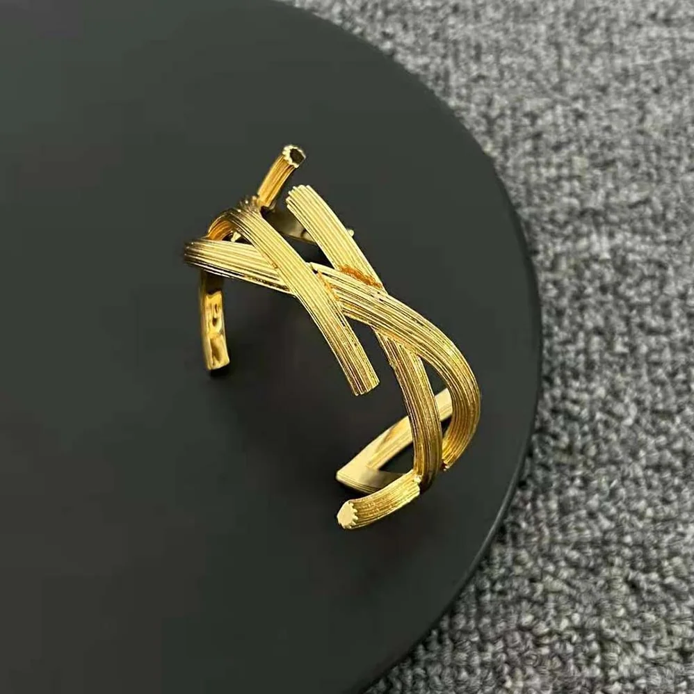 Saint Laurent YSL Opyum Twist Cuff Bracelet in Metal for Women Saint Laurent YSL Opyum Twist Cuff Bracelet in Metal for Women