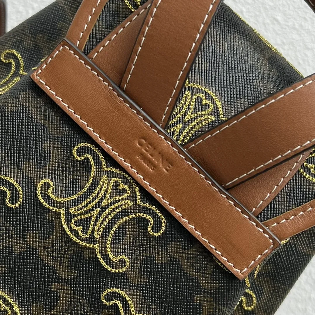 Celine Mini Backpack Folco In Triomphe Canvas With Triomphe Heart Embroidery Brown / .04LU Celine Mini Backpack Folco In Triomphe Canvas With Triomphe Heart Embroidery Brown / .04LU