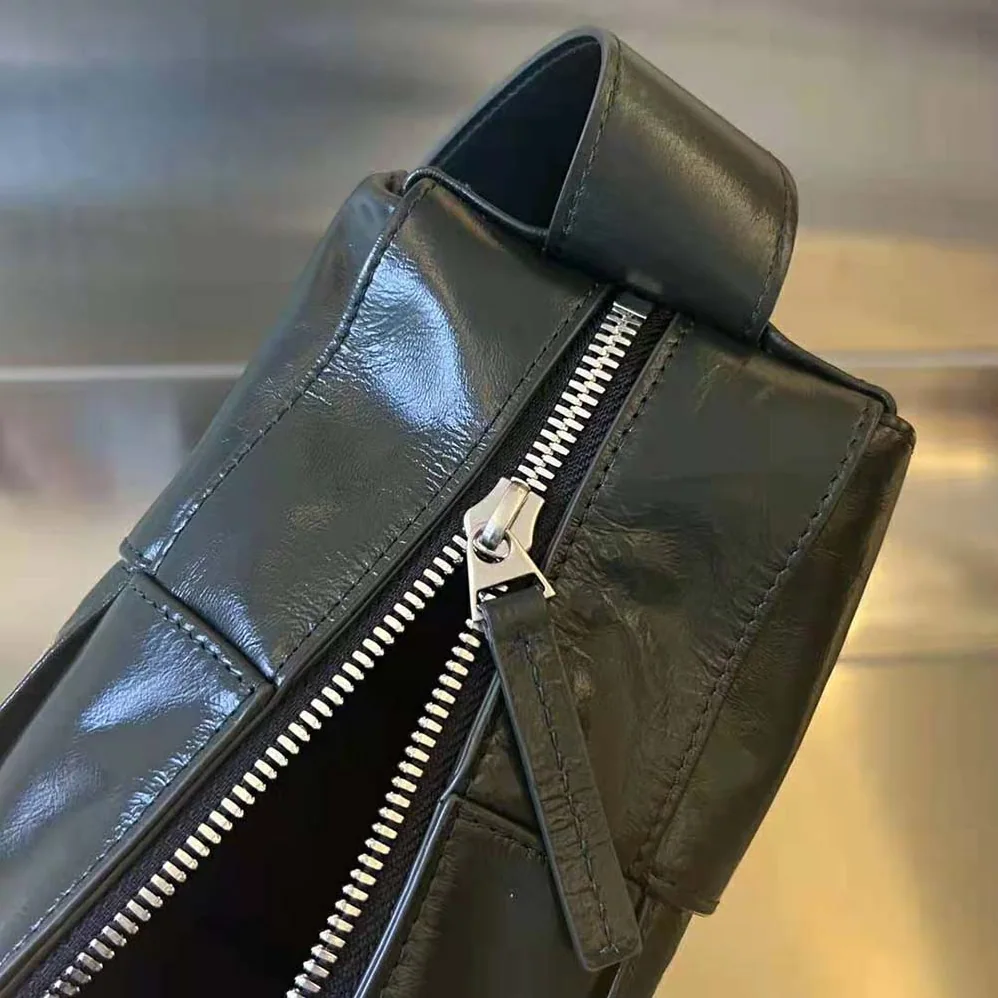 Bottega Veneta Intreccio Slouchy Leather Cross-Body Arco Camera Bag for Women in Black