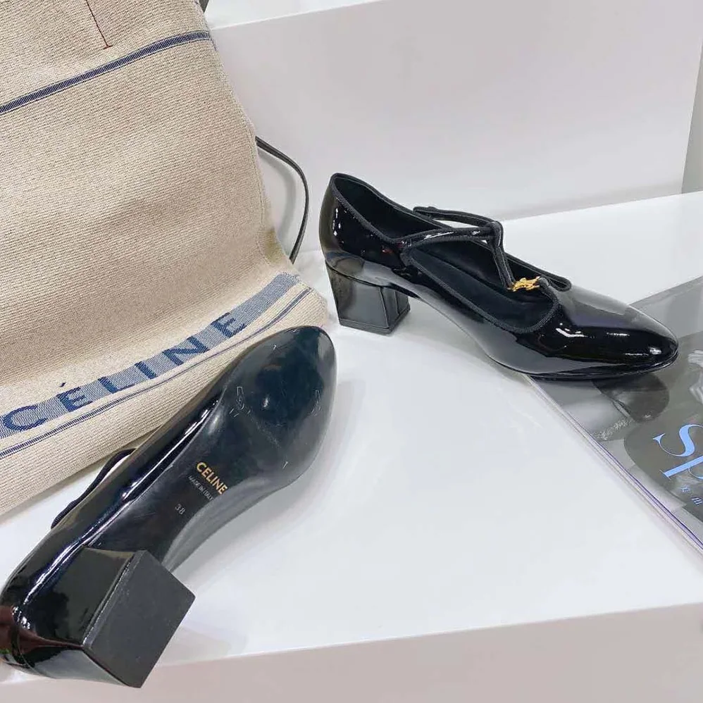 Celine Babies T-Bar Pump in Patent Calfskin and Grosgrain for Women in Black Celine Babies T-Bar Pump in Patent Calfskin and Grosgrain for Women in Black