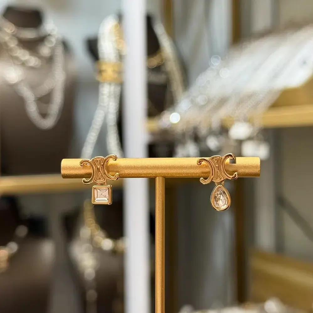 Celine Triomphe Twinkle Earrings in Strass and Brass with Gold Finish for Women