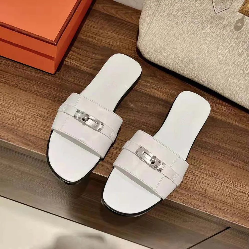 Hermes Giulia Sandal in Calfskin with Iconic Palladium-Plated Kelly Buckle for Women in White Hermes Giulia Sandal in Calfskin with Iconic Palladium-Plated Kelly Buckle for Women in White