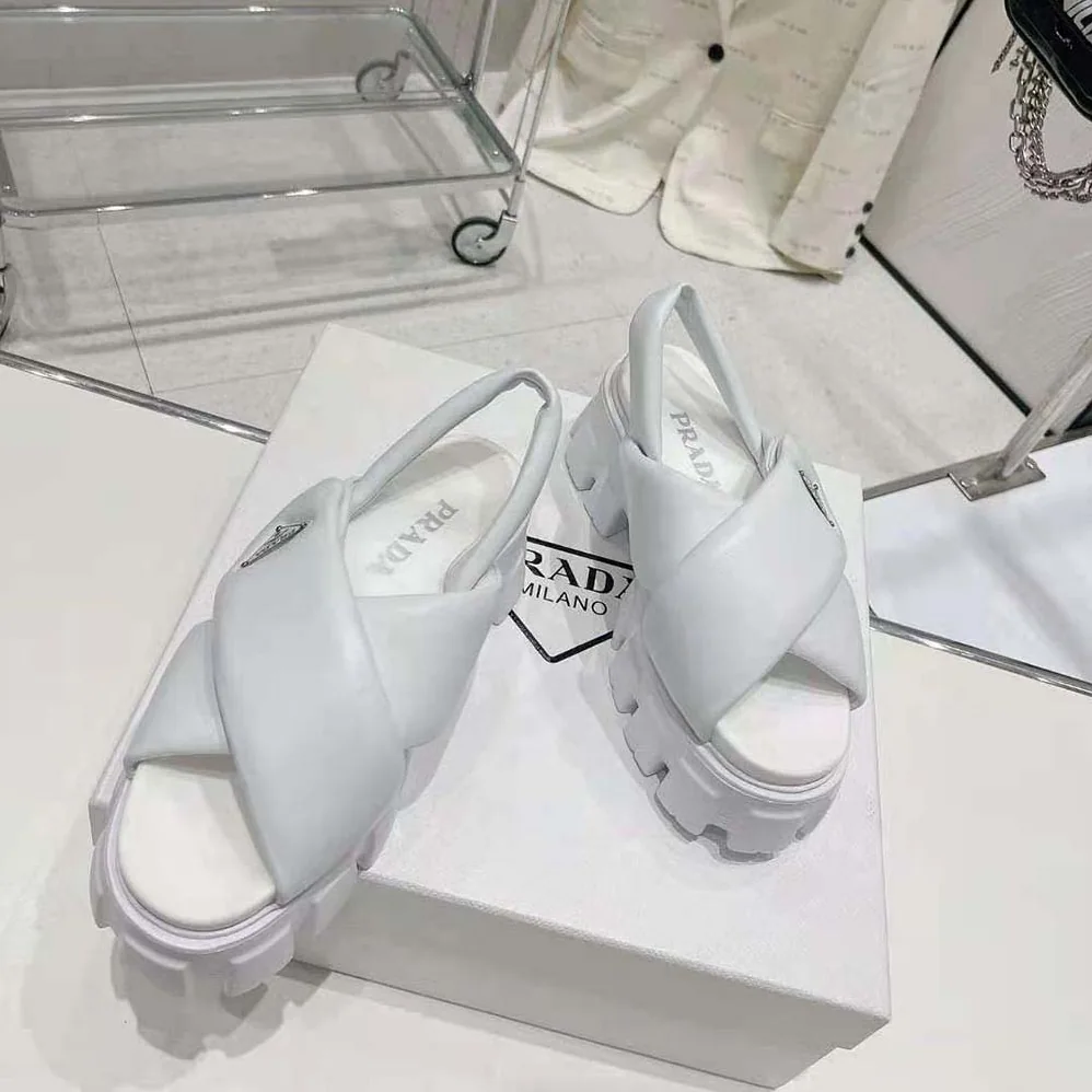 Prada Monolith Padded Nappa Leather Sandals for Women in White Prada Monolith Padded Nappa Leather Sandals for Women in White
