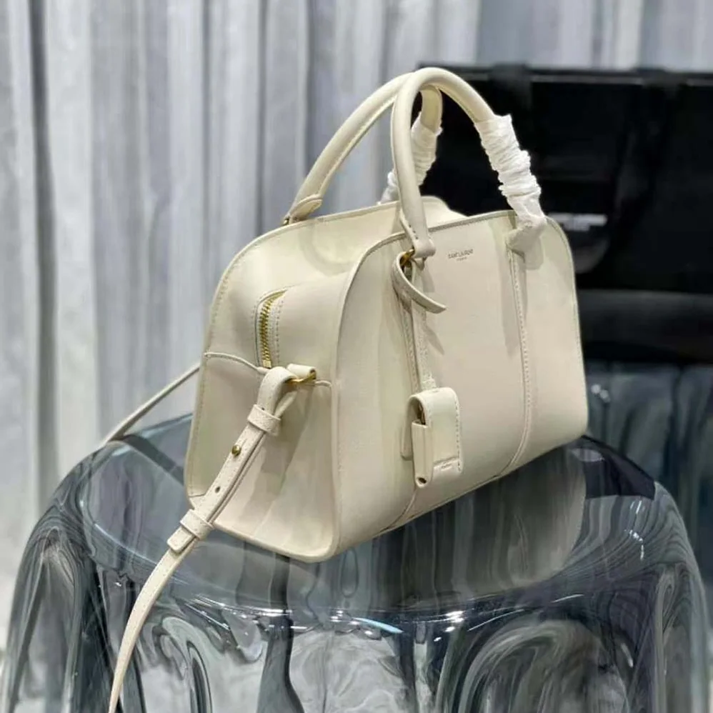 Saint Laurent YSL Lock Baby Duffle in Smooth Leather for Women in White Saint Laurent YSL Lock Baby Duffle in Smooth Leather for Women in White