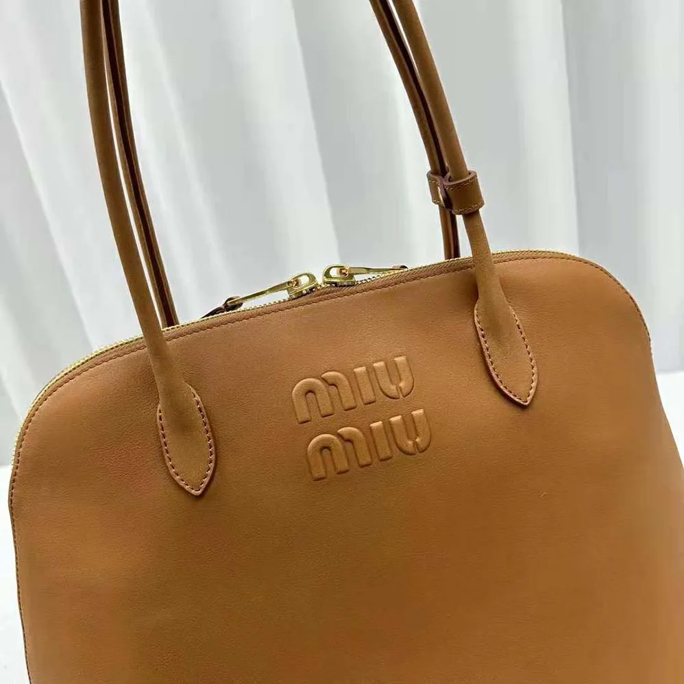 Miu Miu Leather Bag with Embossed Lettering Logo for Women in Brown Miu Miu Leather Bag with Embossed Lettering Logo for Women in Brown