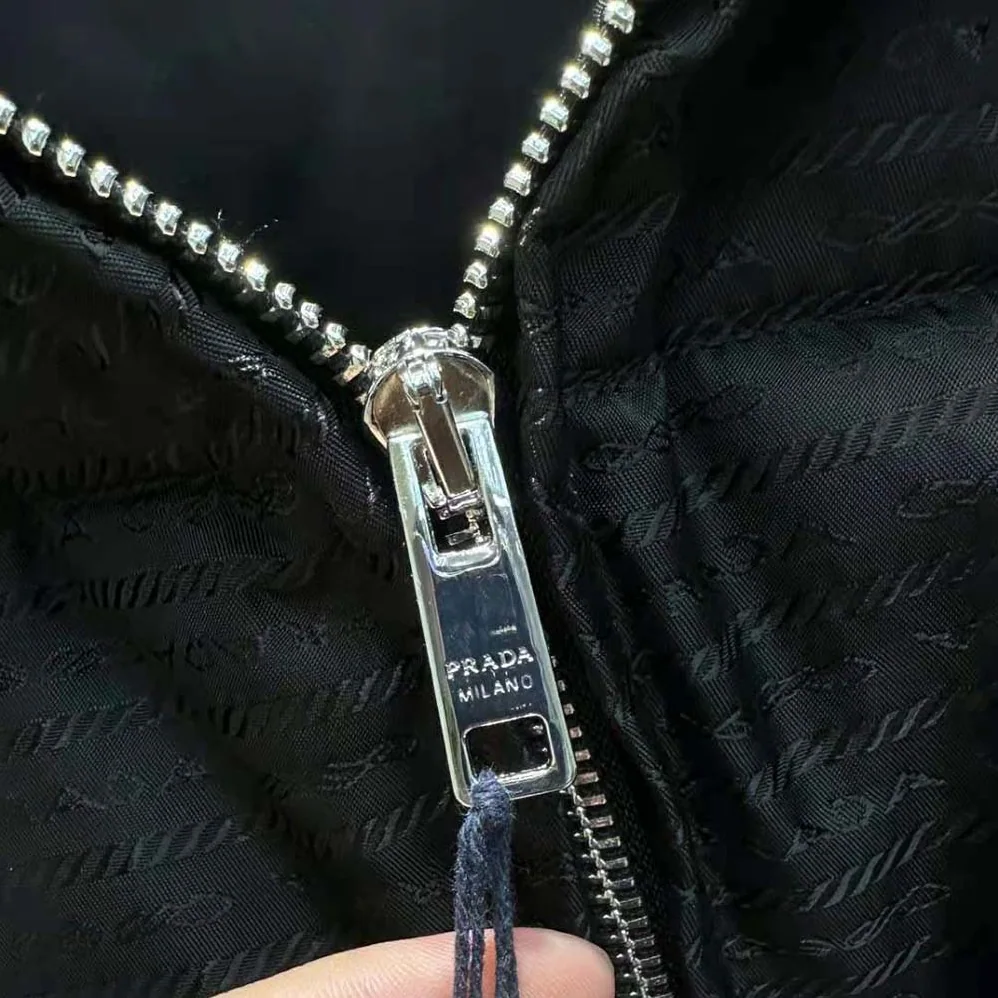 Prada Re-Nylon Hooded Down Jacket for Women in Black Prada Re-Nylon Hooded Down Jacket for Women in Black
