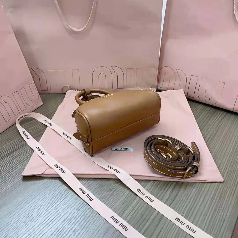 Miu Miu Mini Leather Top-handle Bag for Women in Brown