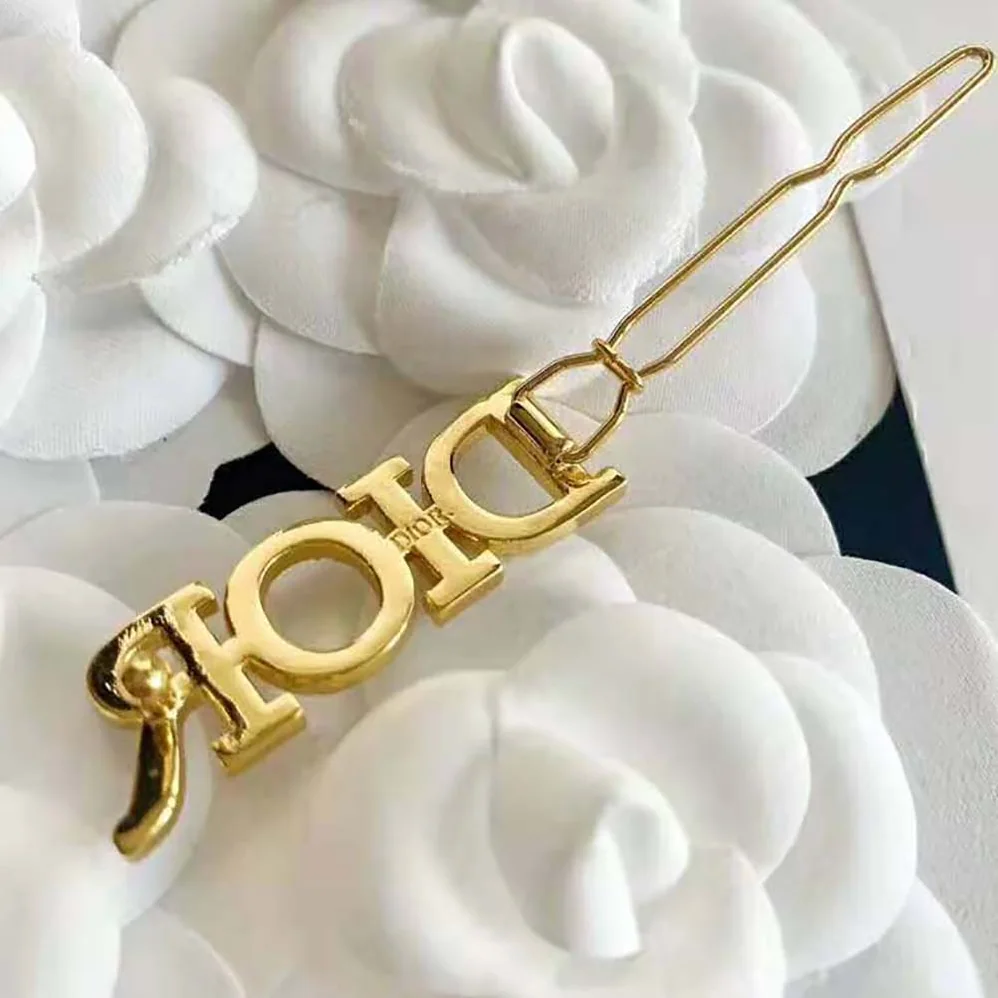 Dior Dio(r)evolution Barrette Gold for Women in Finish Metal Dior Dio(r)evolution Barrette Gold for Women in Finish Metal
