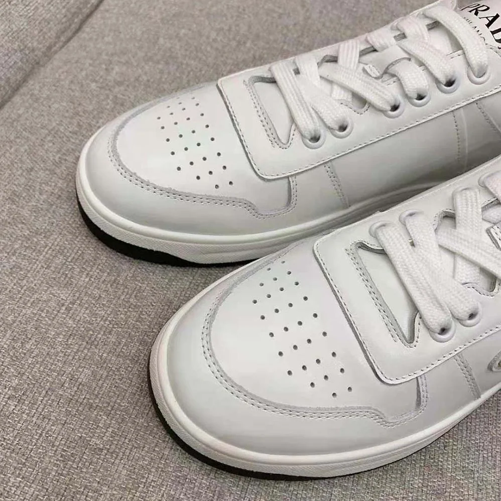 Prada Downtown Perforated Leather Sneakers for Women in White