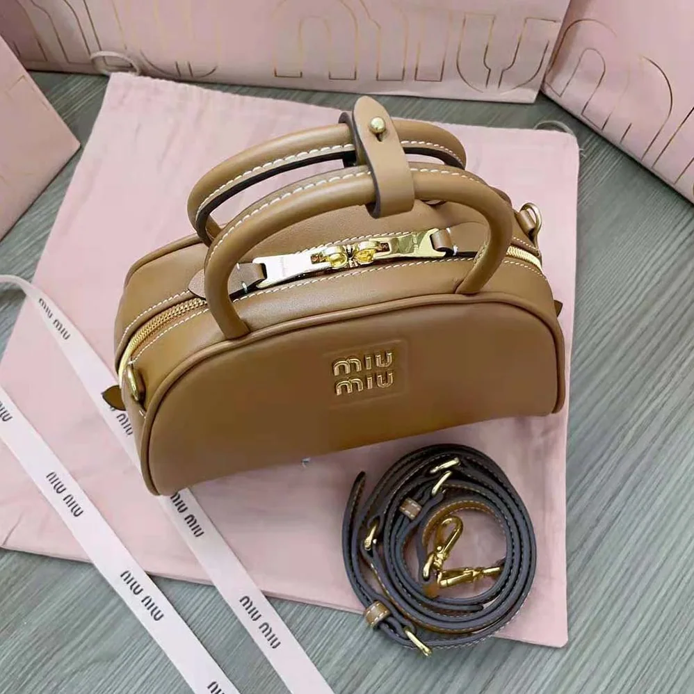 Miu Miu Medium Leather Top-handle Bag for Women in Brown