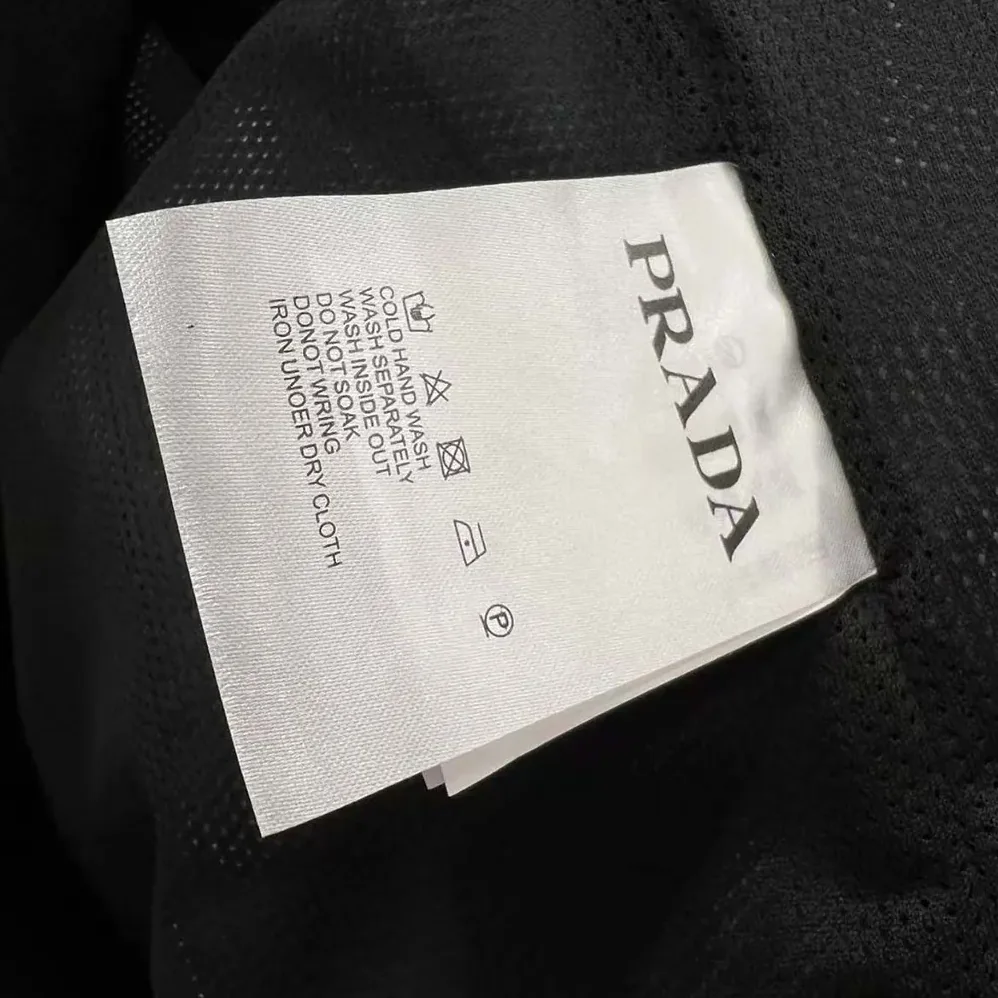Prada Re-Nylon Blouson Jacket with Triangle Logo for Women in Black