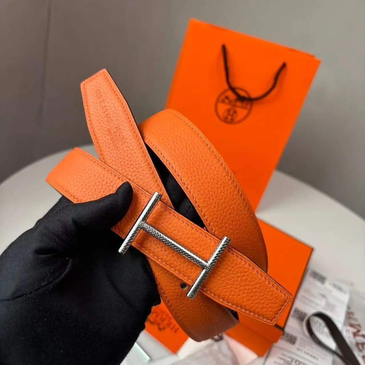 Hermès Hisseo Belt Buckle And Reversible Leather Strap Noir in Orange