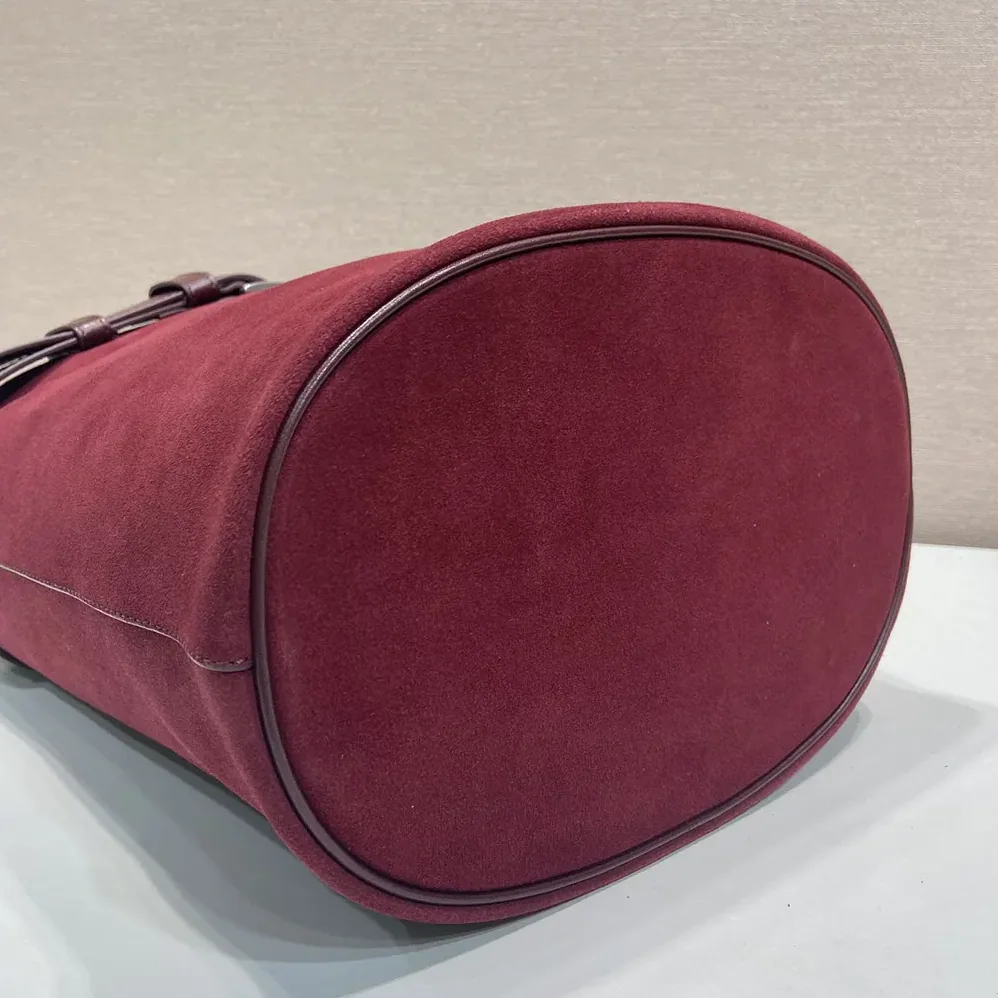 Prada Buckle Belted Suede Bucket Bag for Women in Burgundy Prada Buckle Belted Suede Bucket Bag for Women in Burgundy