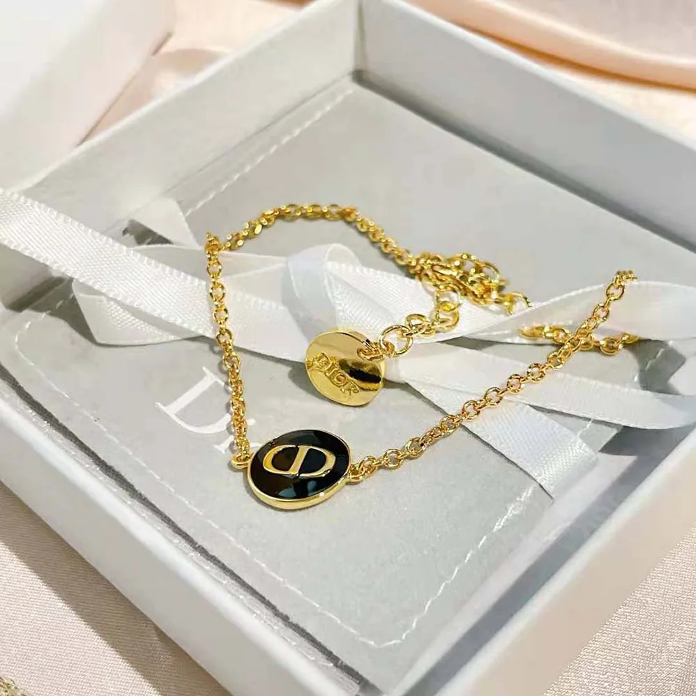 Dior Petit CD Bracelet Gold-Finish Metal and Black Lacquer for Women Dior Petit CD Bracelet Gold-Finish Metal and Black Lacquer for Women