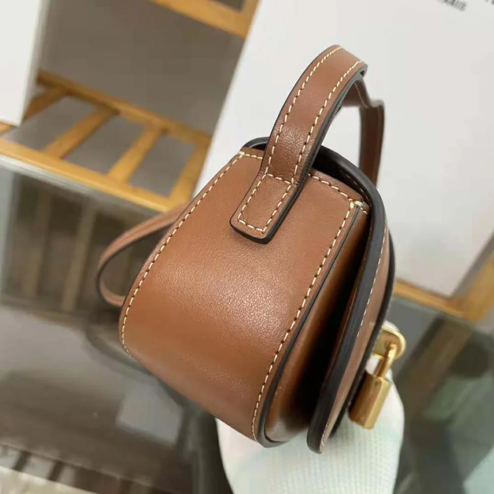 Celine Clutch on Strap in Smooth Calfskin for Women in Brown