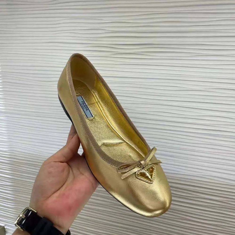 Prada Nappa Leather Ballerinas for Women in Gold Prada Nappa Leather Ballerinas for Women in Gold