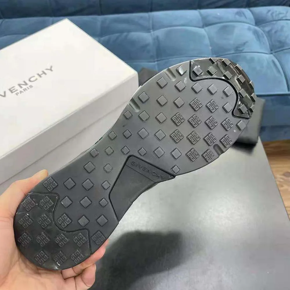 Givenchy Giv 1 Sneakers in Leather with Tag Effect Prints for Men in Black