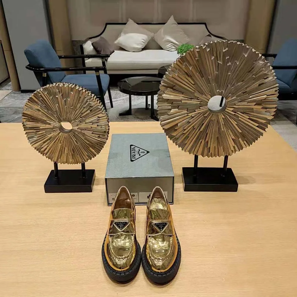 Prada Metallic Leather Loafers for Women in Gold