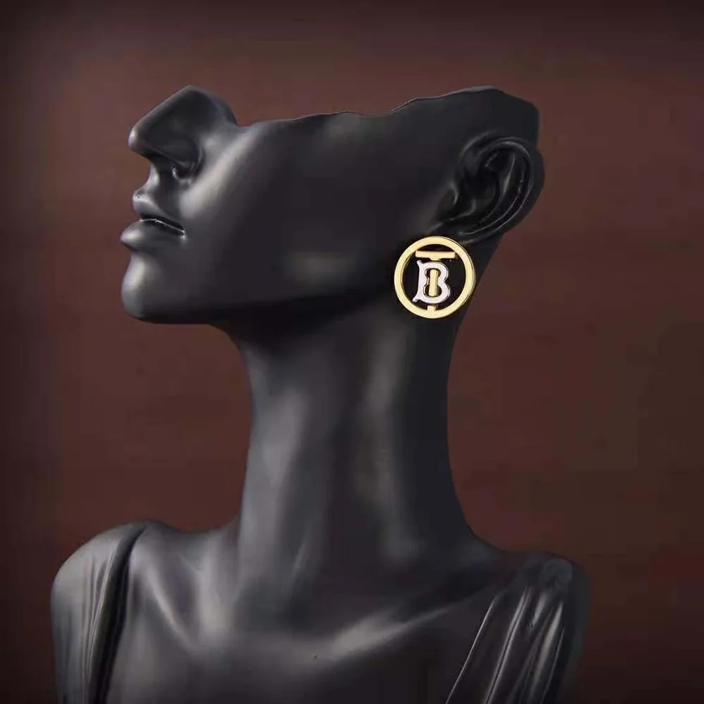 Burberry Gold and Palladium for Women in plated Monogram Motif Earrings Burberry Gold and Palladium for Women in plated Monogram Motif Earrings