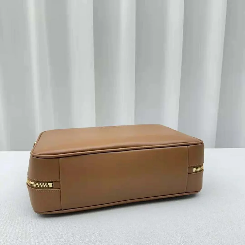 Miu Miu Leather Top-handle Bag with Embossed Lettering Logo for Women in Brown Miu Miu Leather Top-handle Bag with Embossed Lettering Logo for Women in Brown