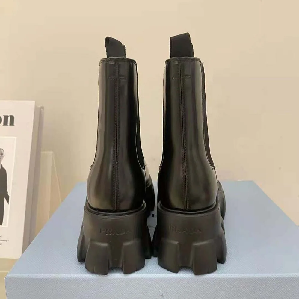 Prada Monolith Brushed Leather Booties for Women in Black
