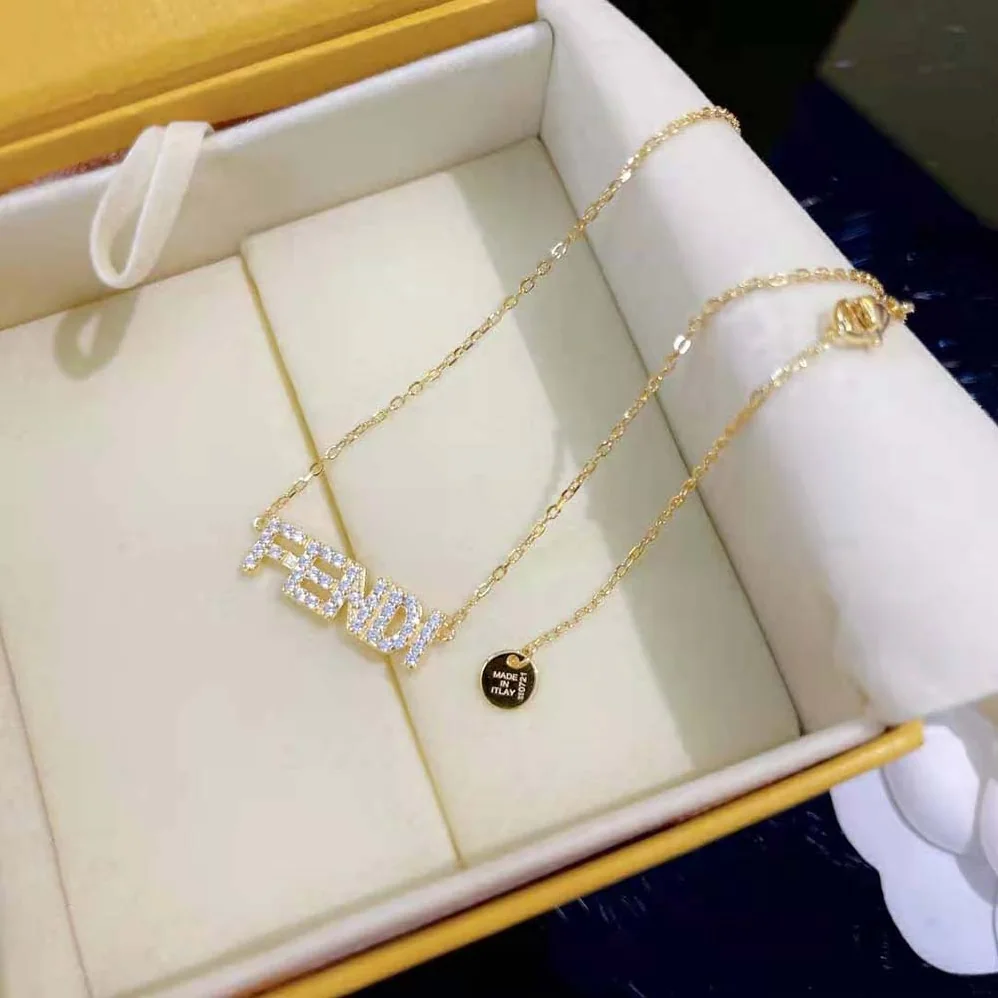 Fendi Signature Gold for Women in colored Nnecklace Clip Closure