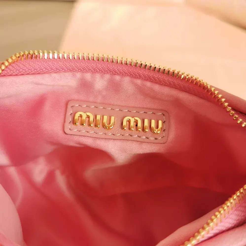 Miu Miu Wander Matelassé Nappa Leather Hobo Mini-Bag for Women in Pink