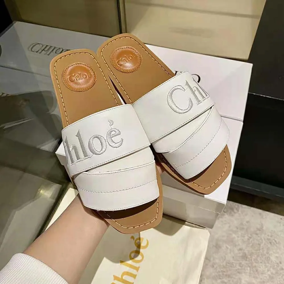 Chloe Woody Flat Mule for Women in White Chloe Woody Flat Mule for Women in White