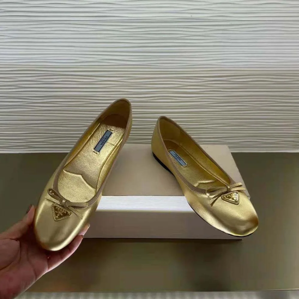 Prada Nappa Leather Ballerinas for Women in Gold Prada Nappa Leather Ballerinas for Women in Gold