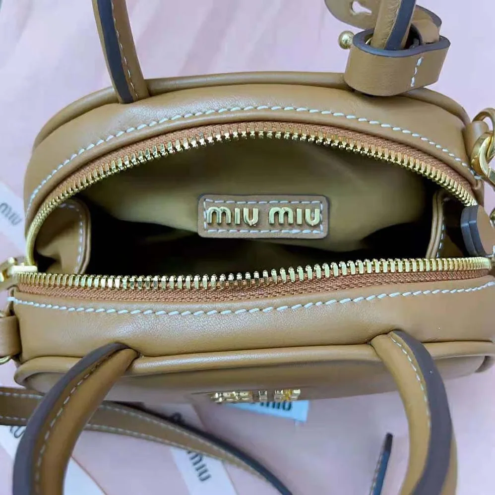 Miu Miu Mini Leather Top-handle Bag for Women in Brown