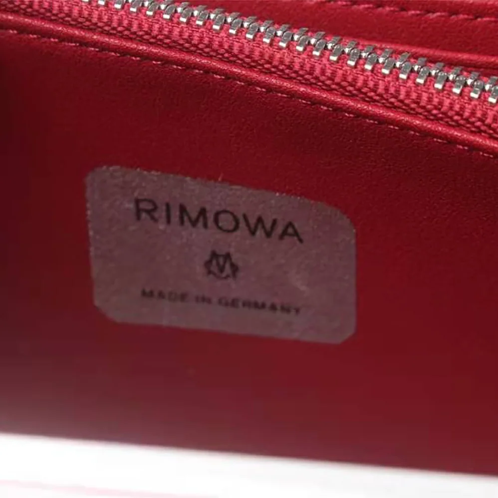 Dior Dior and Rimowa Personal Clutch Aluminum and Grained Calfskin for Men in Pink