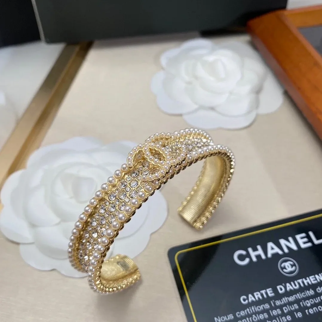 Chanel Pearl And Crystal Interlocking CC Cuff Bracelet Gold Hardware Chanel Pearl And Crystal Interlocking CC Cuff Bracelet Gold Hardware