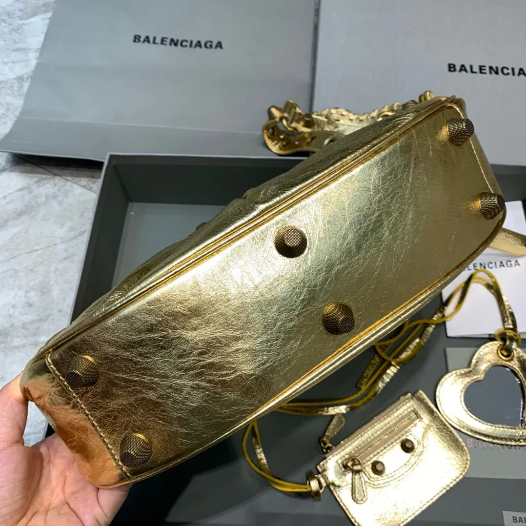 Balenciaga Le Cagole XS Shoulder Bag In Gold