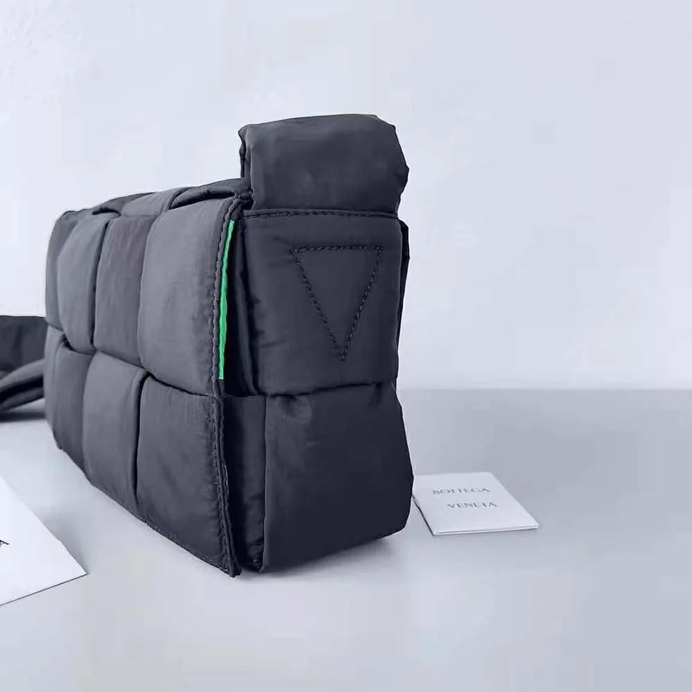 Bottega Veneta Padded Tech Cassette Medium Padded Intreccio Nylon Crossbody Bag for Men in Black Bottega Veneta Padded Tech Cassette Medium Padded Intreccio Nylon Crossbody Bag for Men in Black