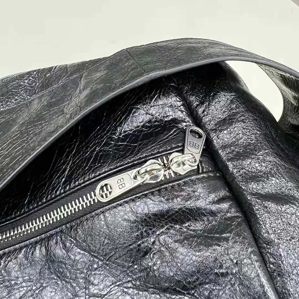 Balenciaga Superbusy Large Sling Bag in off Black Arena Lambskin for Women