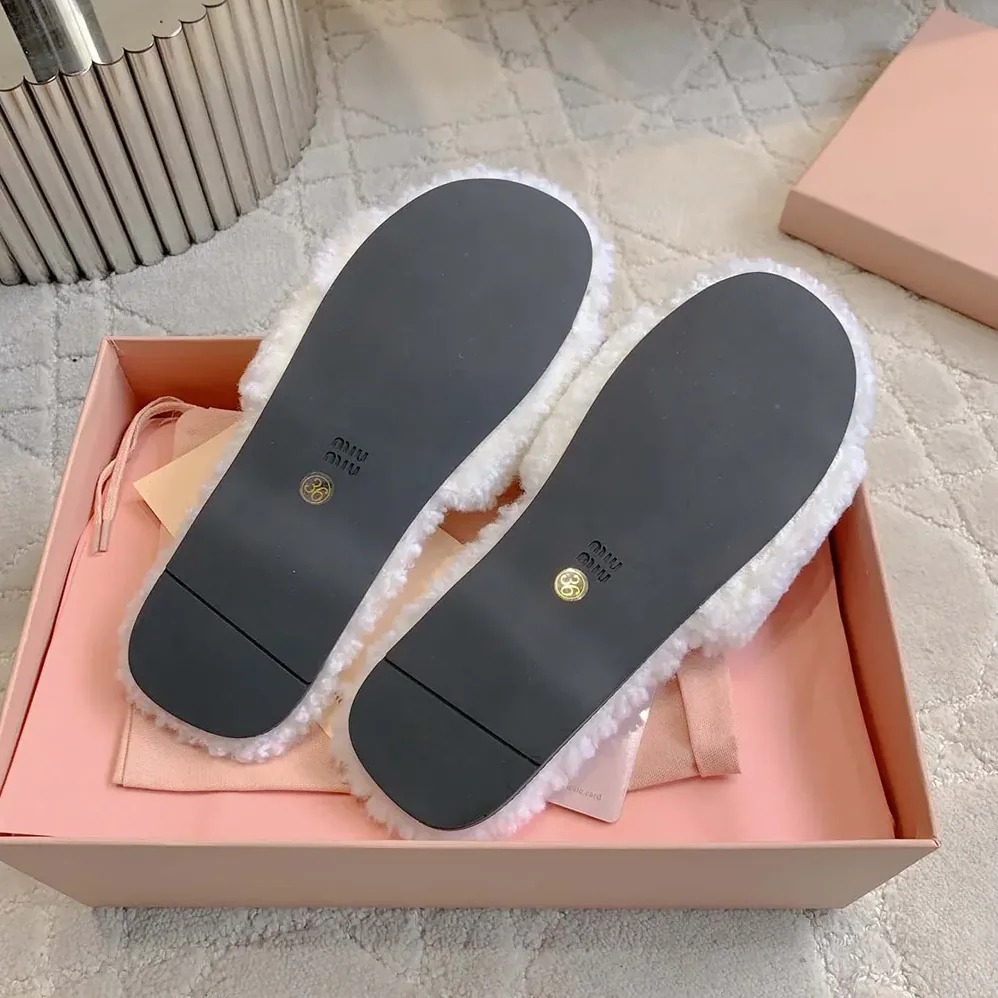 Miu Miu Shearling Slides with Leather Logo for Women