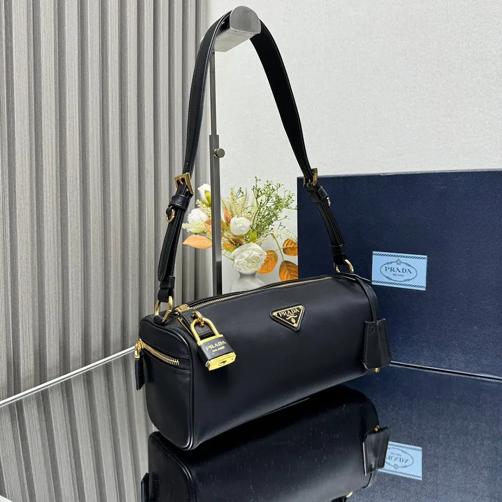 Prada Medium Re-Nylon and Leather Shoulder Bag with Padlock for Women Prada Medium Re-Nylon and Leather Shoulder Bag with Padlock for Women