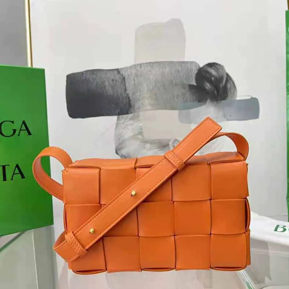 Bottega Veneta Cassette Intreccio Leather Cross-Body Bag for Women in Orange Bottega Veneta Cassette Intreccio Leather Cross-Body Bag for Women in Orange